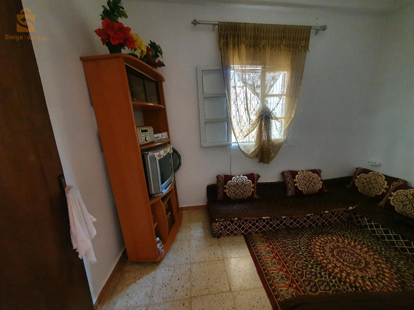 حي تونسي 120مسكن اغلال فيها ثلاث غرف و كوزينة و حوش كبير